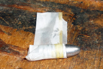 Rolling bullet in paper